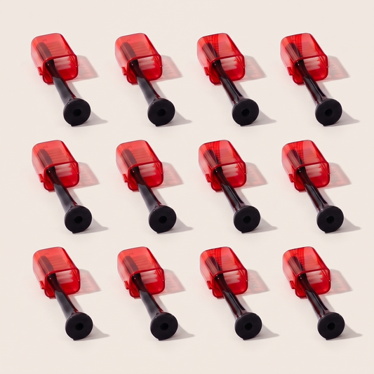 Twelve Solstra replacement brush heads in a four-by-three grid