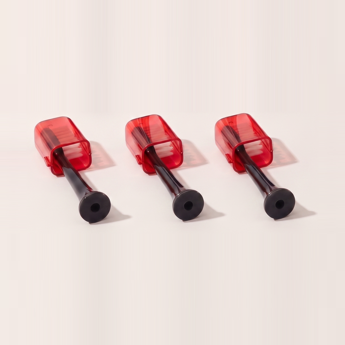 Close-up of three Solstra replacement brush heads